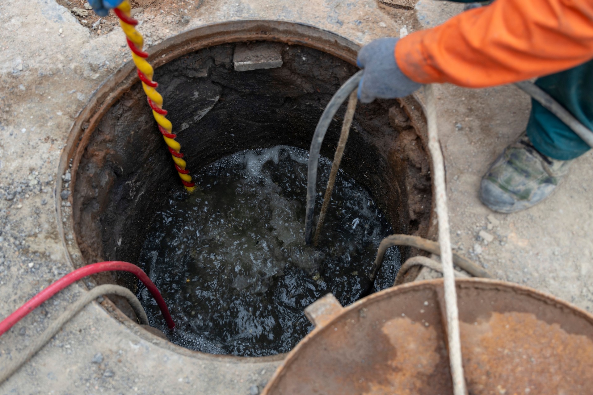 City municipal workers are doing urban sewer dredging
